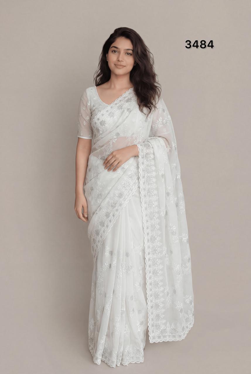 Elegant Pure White Georgette Saree with Silver Embroidery & Stone Work