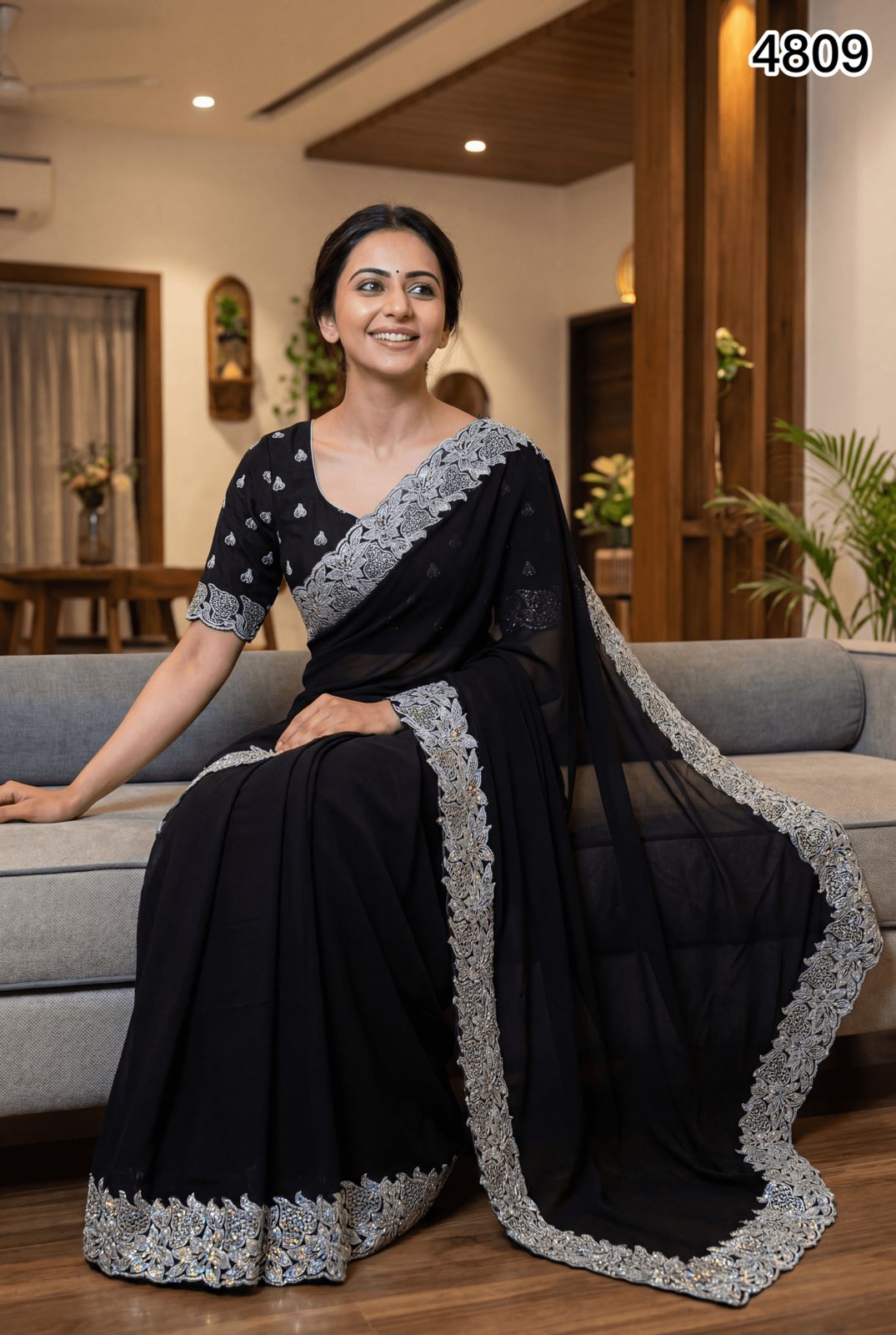 Elegant Black Georgette Saree with Silver Embroidery & Stone Work – Party & Evening Wear