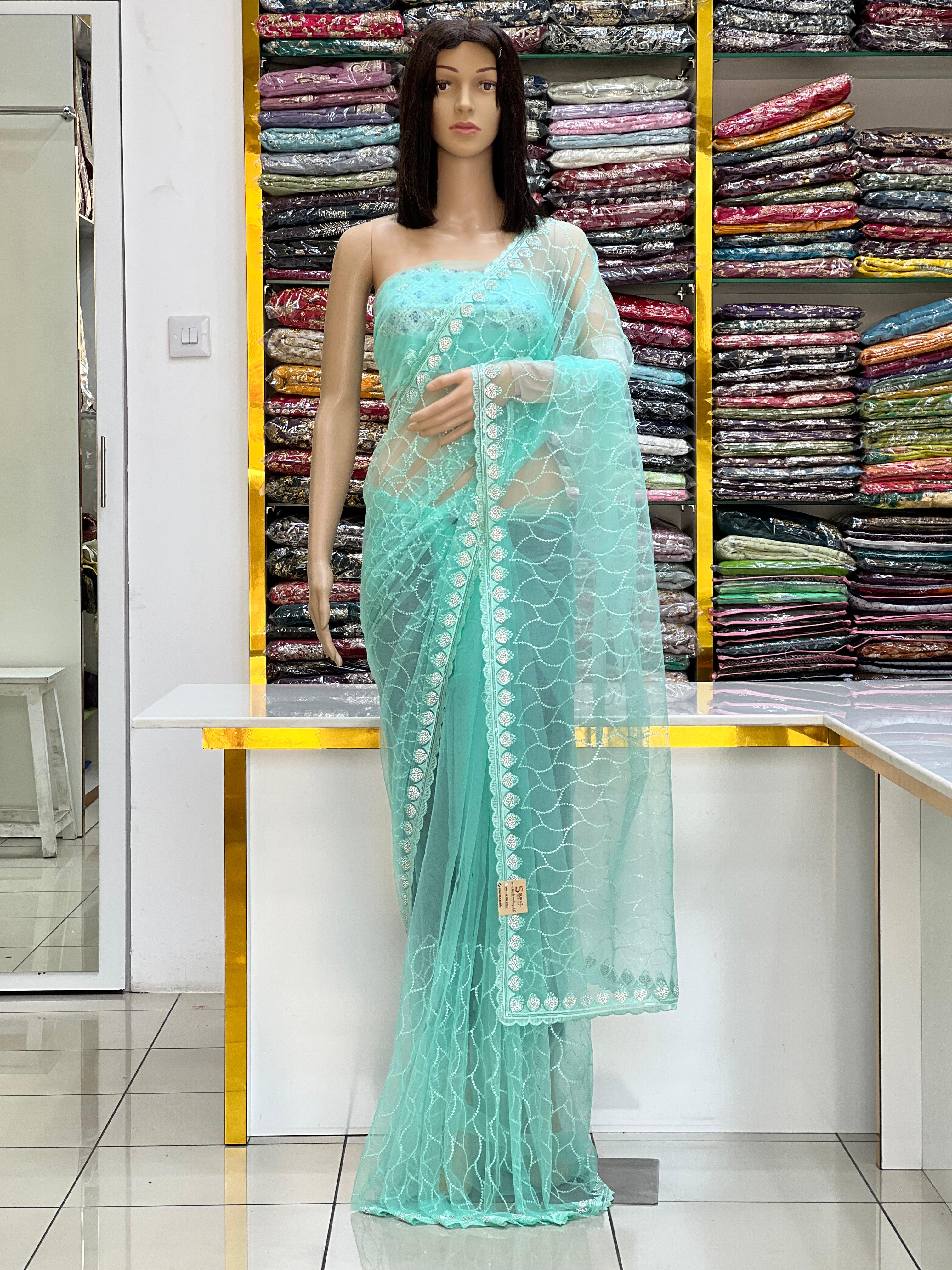 Sea Green Net Embroidered Saree with Elegant Border