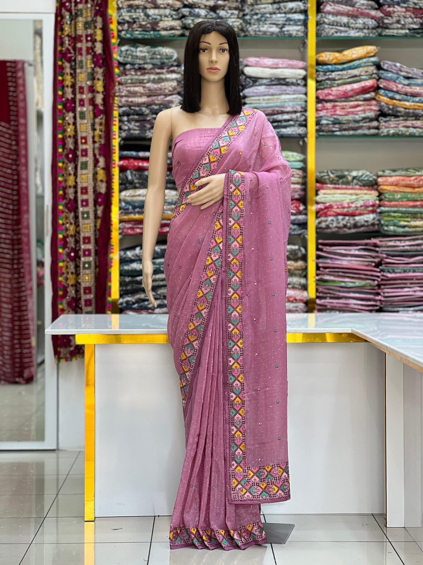 Vibrant Cruncy Saree Collection with Multi-Color Geometric Embroidered Border