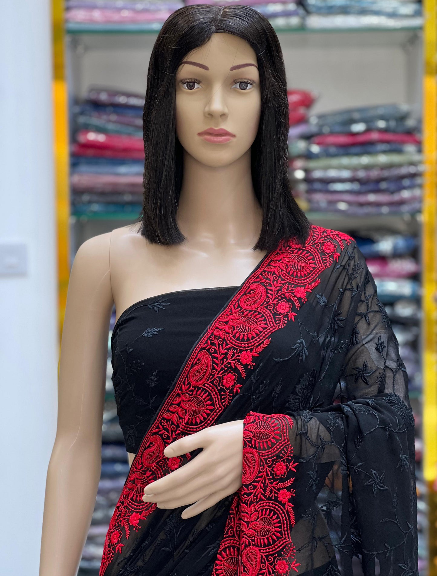 Elegant Black Georgette Saree with Rich Red Embroidered Border
