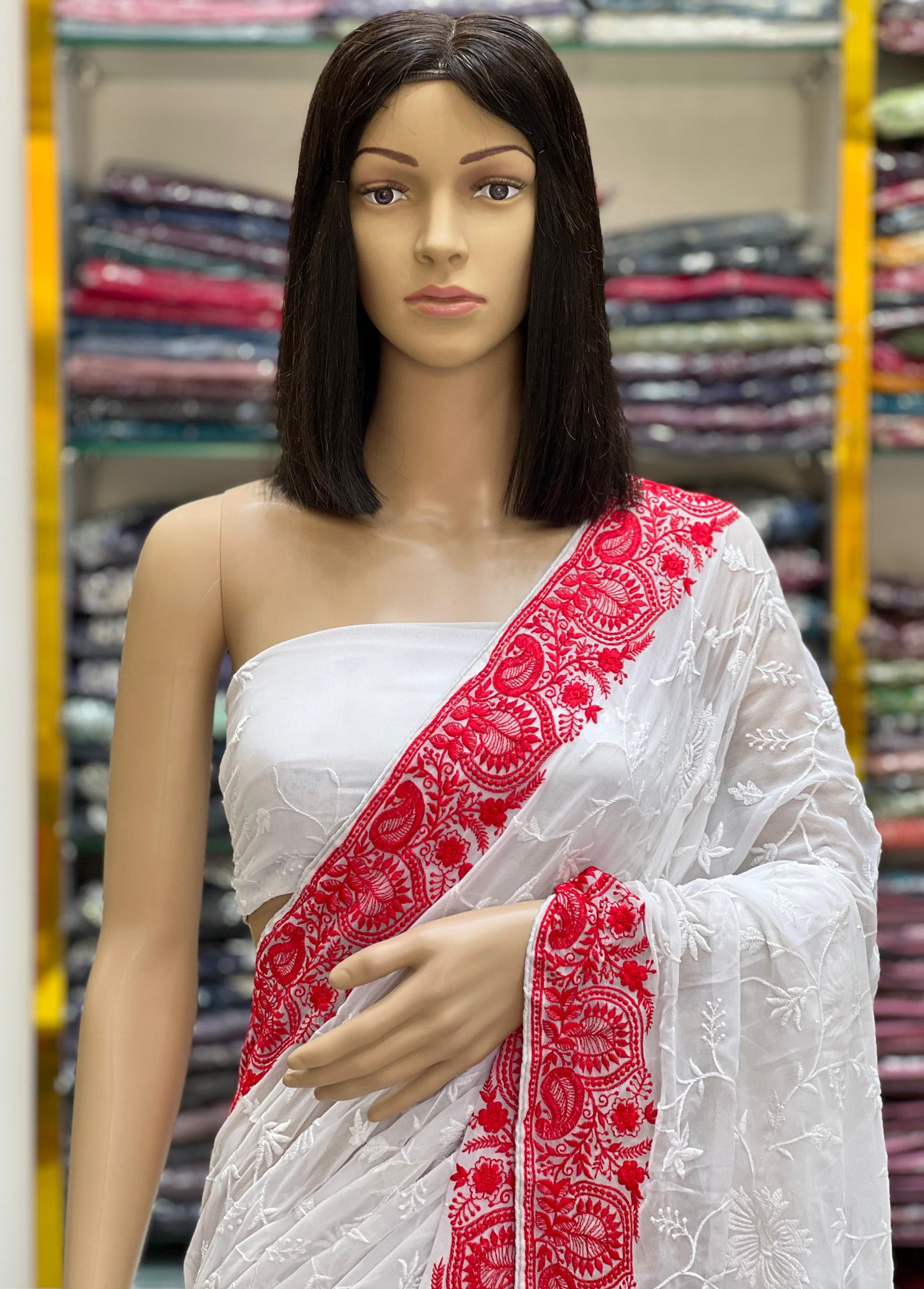 White Georgette Saree with Red Embroidered Border – Elegant & Timeless Design