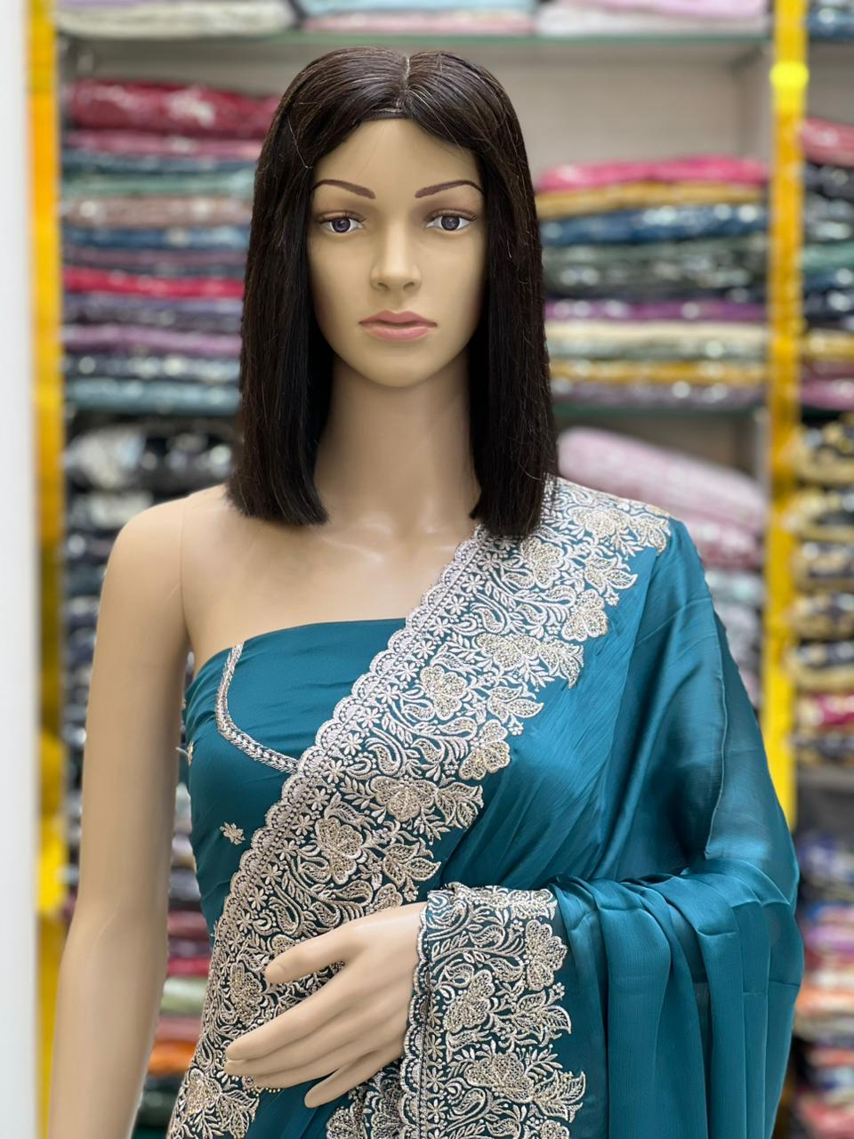 Elegant Teal Silk Saree with Heavy Silver Embroidery Border