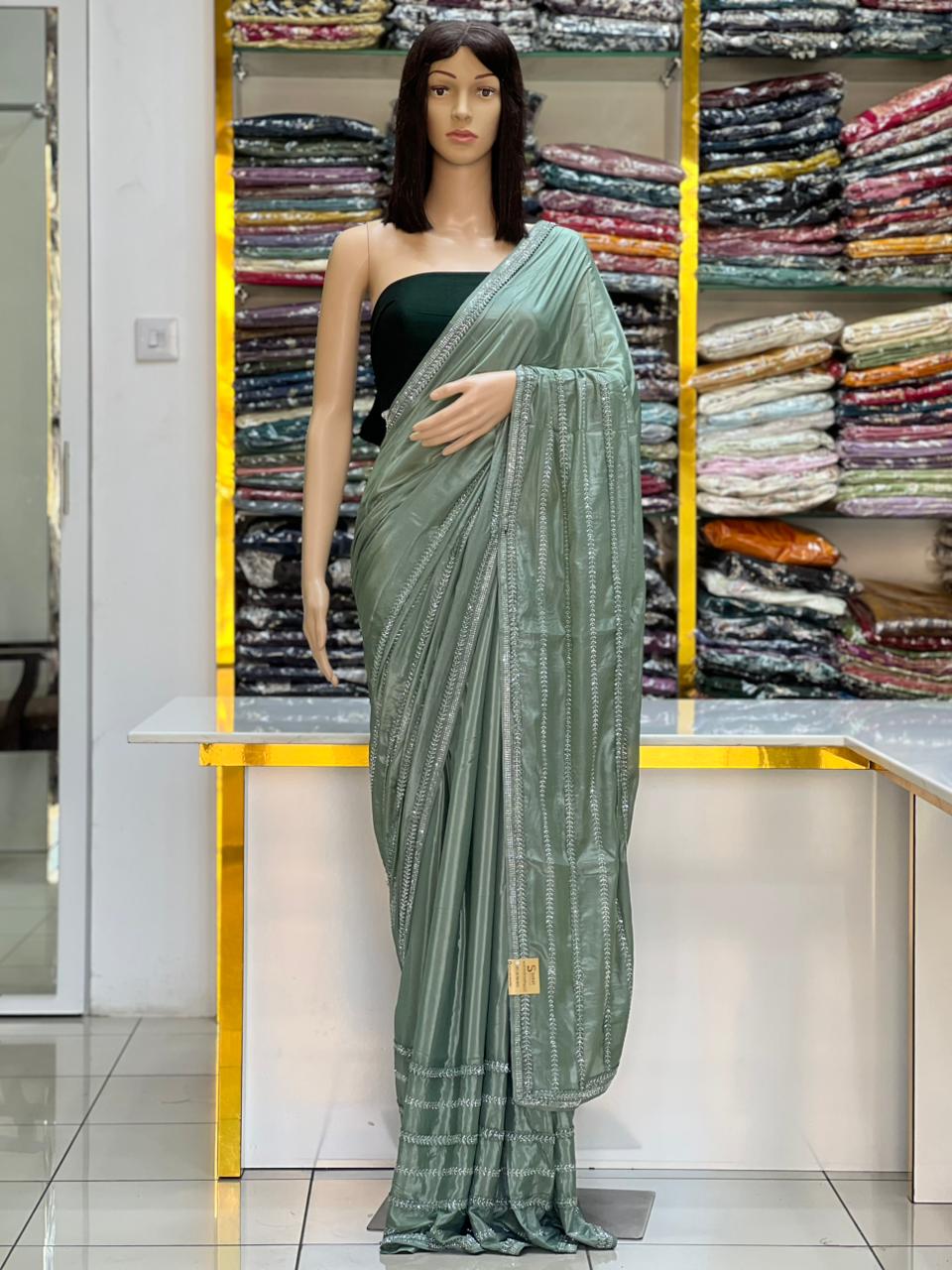 Premium Sage Green Designer Saree with Elegant Thread Embroidery