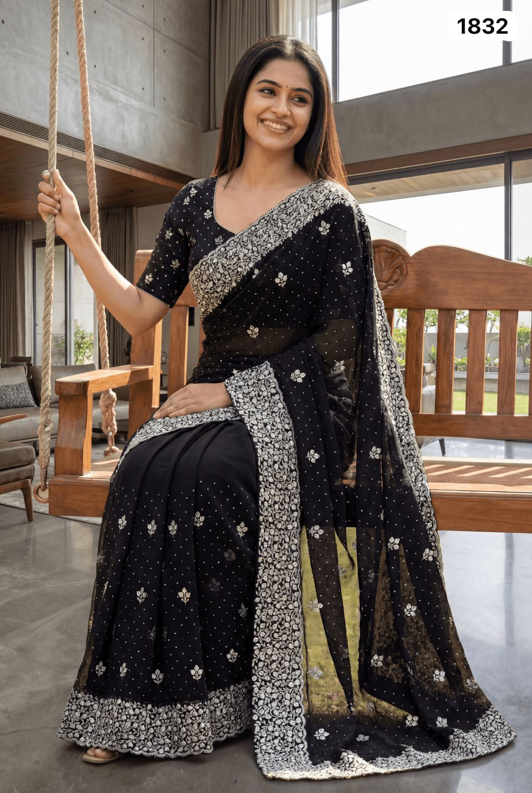 Elegant Black Georgette Saree with Silver Zari Embroidery & Stone Work