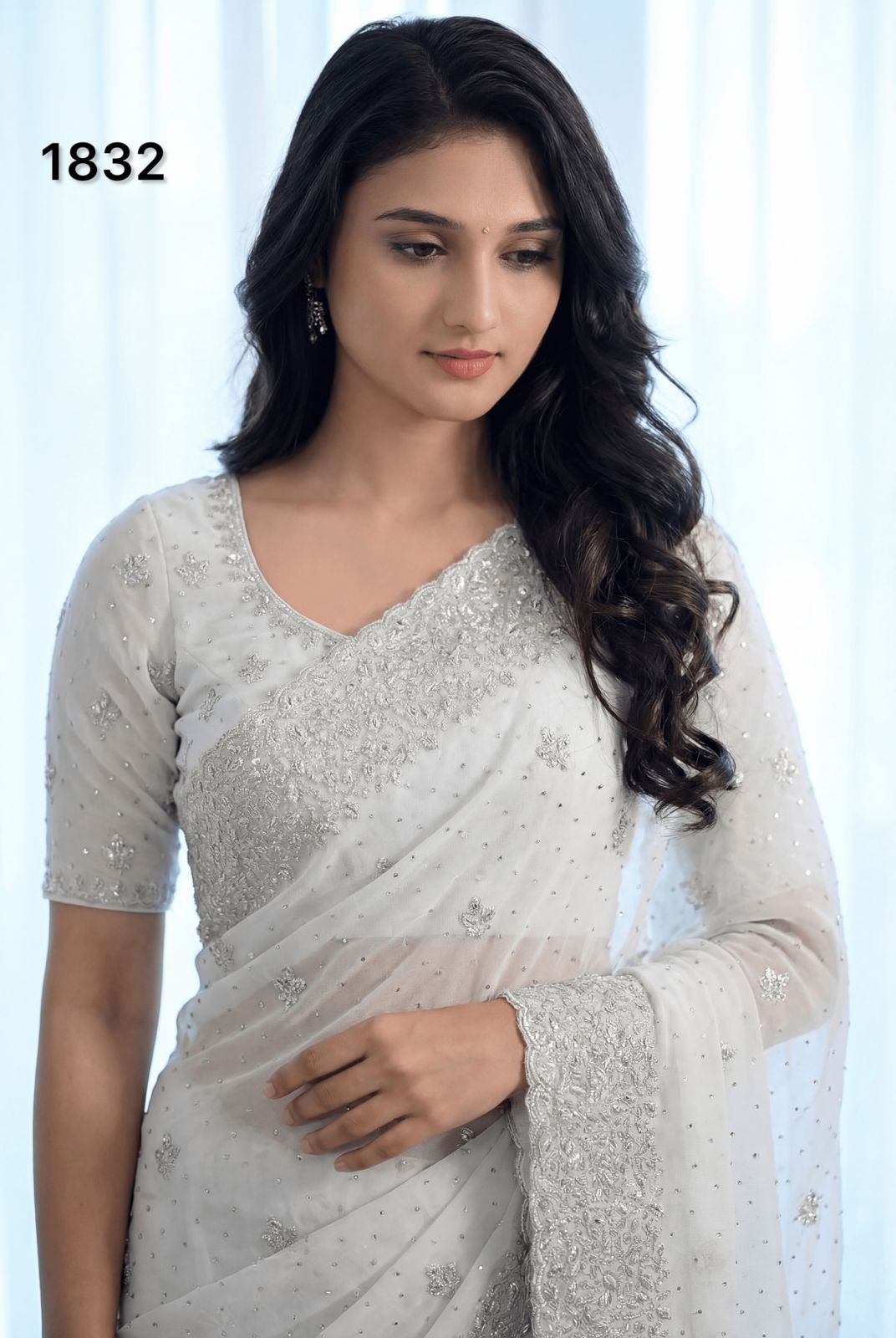 Elegant Pure White Georgette Saree with Silver Embroidery & Stone Work