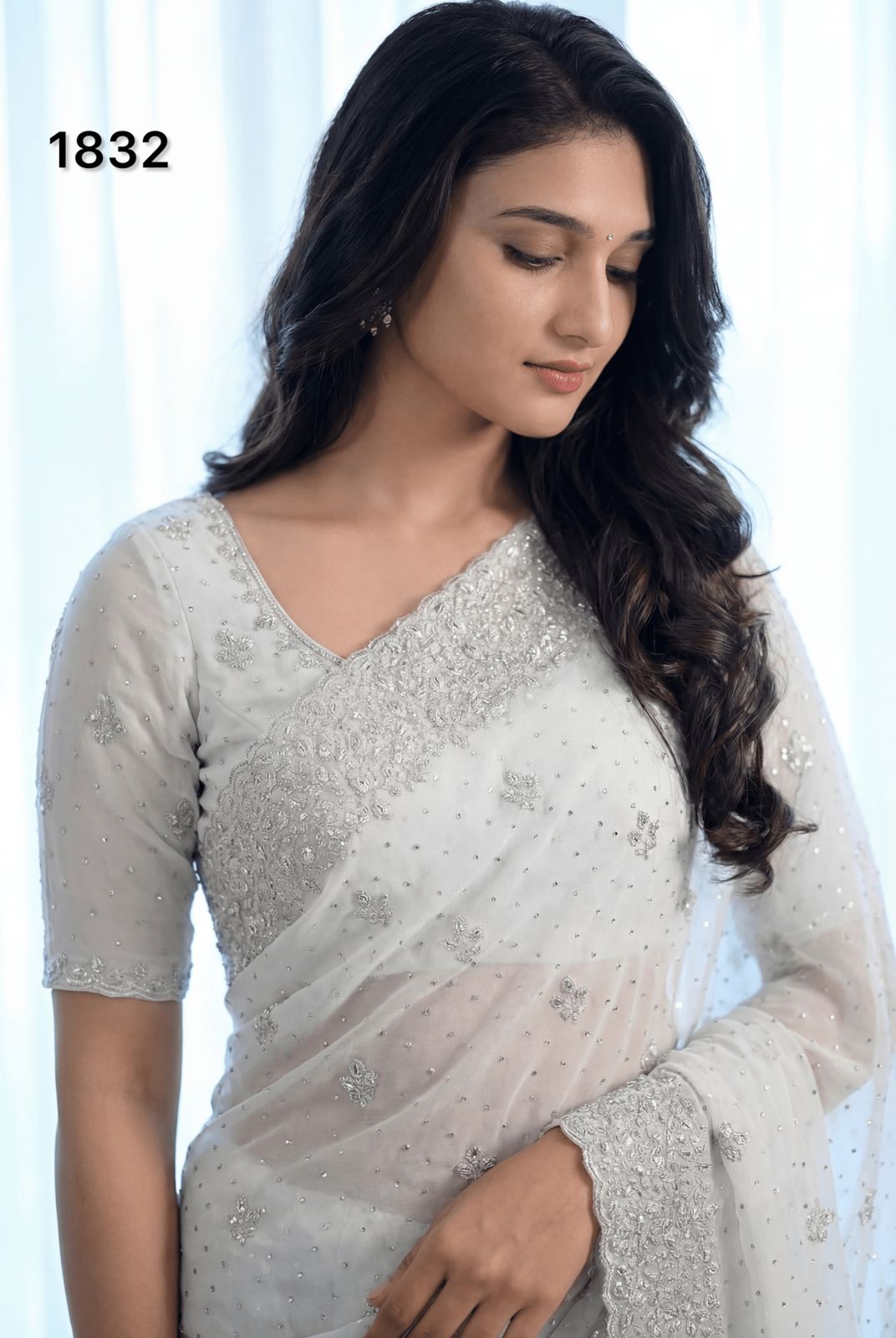 Elegant Pure White Georgette Saree with Silver Embroidery & Stone Work