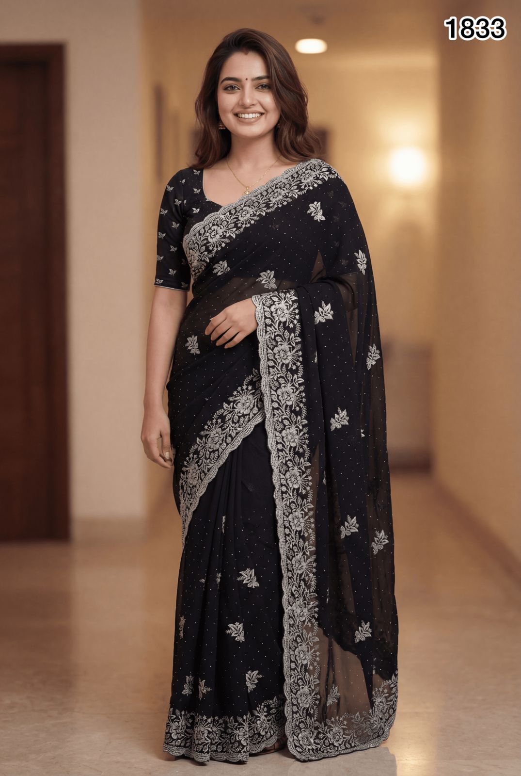 Elegant Black Georgette Saree with Silver Embroidery & Swarovski Stone Work