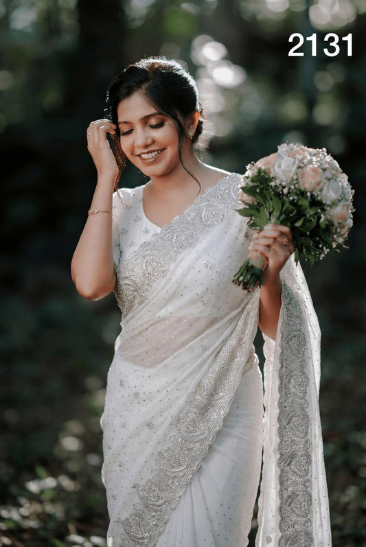 Elegant Pure White Georgette Saree with Silver Embroidery & Stone Work