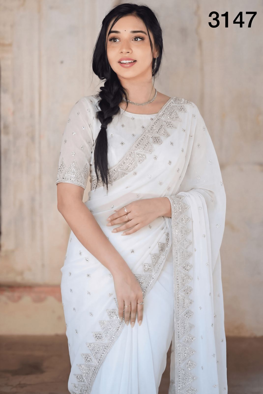 Elegant Pure White Georgette Saree with Silver Embroidery & Stone Work