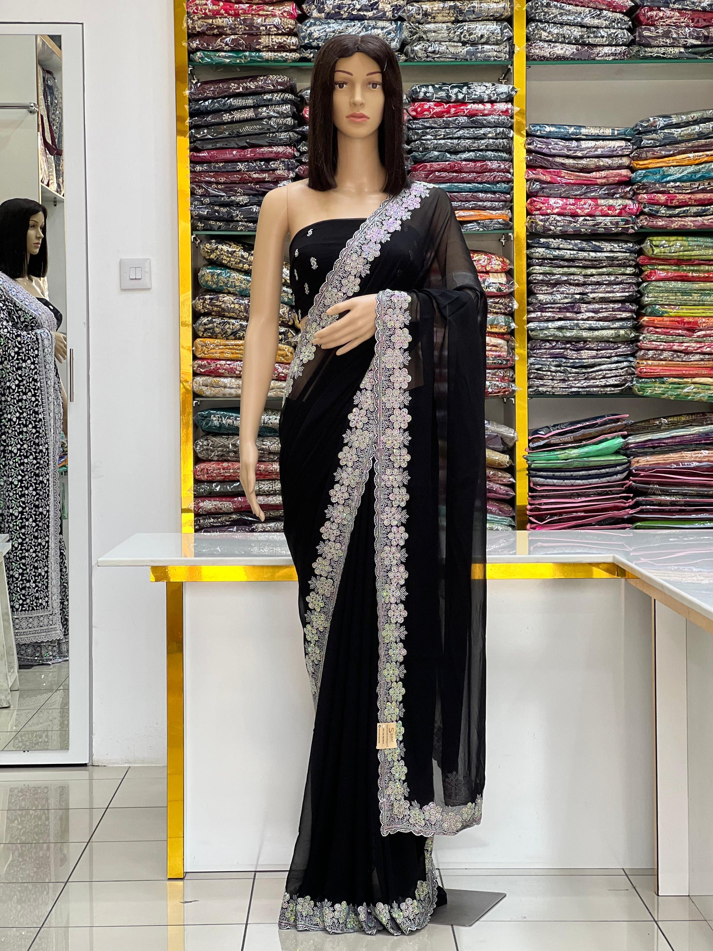 Classic Black Georgette Party Wear Saree With Floral Silver Embroidery Border