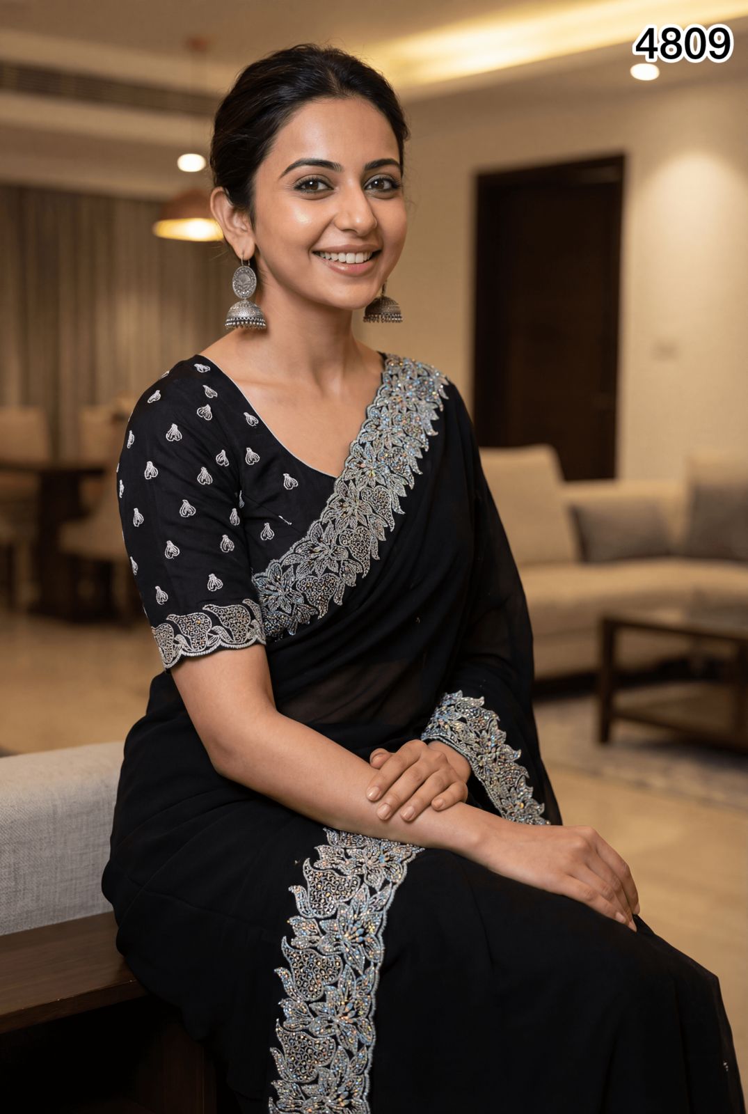 Elegant Black Georgette Saree with Silver Embroidery & Stone Work – Party & Evening Wear