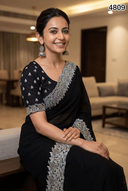 Elegant Black Georgette Saree with Silver Embroidery & Stone Work – Party & Evening Wear