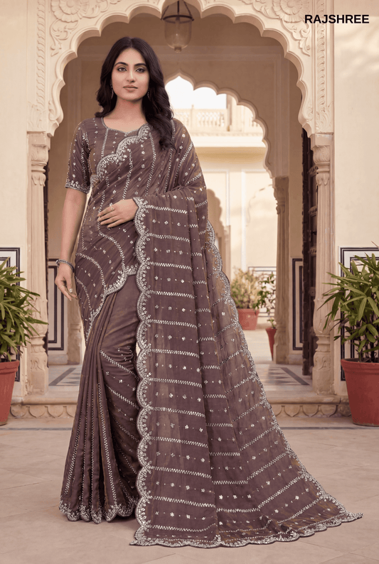 Elegant Mauve  Fandy Silk Saree with Scalloped Silver beats work