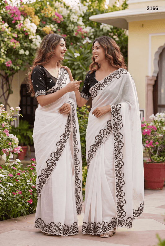 Timeless Elegance: Crunchy White  Saree with Contrast Cutwork Blouse