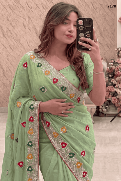 Elegant Green Chiffon Saree with Colorful Embroidery Border