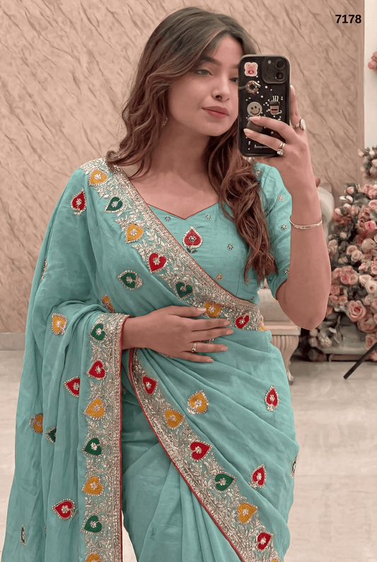 Elegant Sea Green Chiffon Saree with Multicolor Embroidered Border