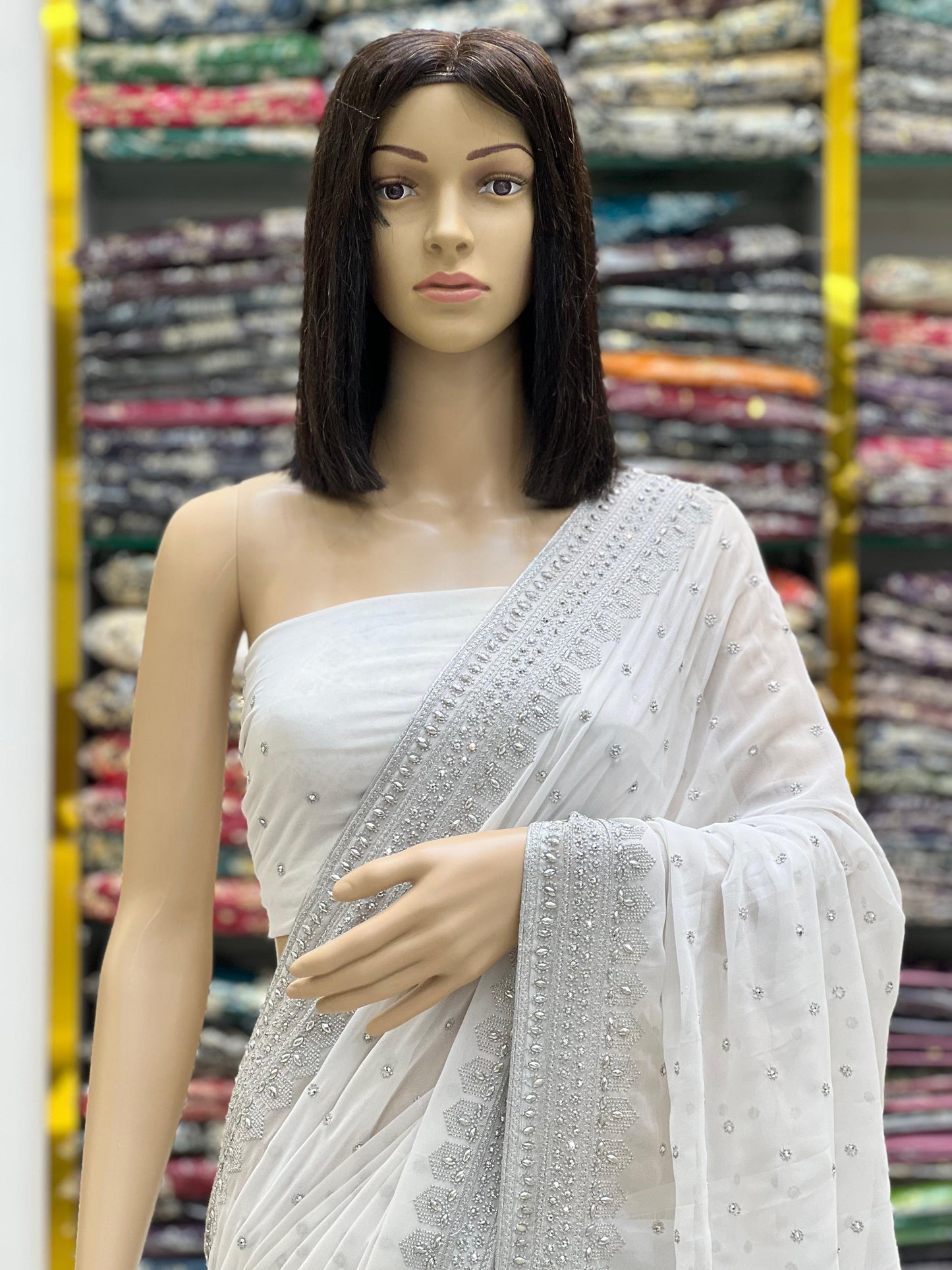 Elegant White Georgette Saree with Silver Zari Embroidery & Stone Work