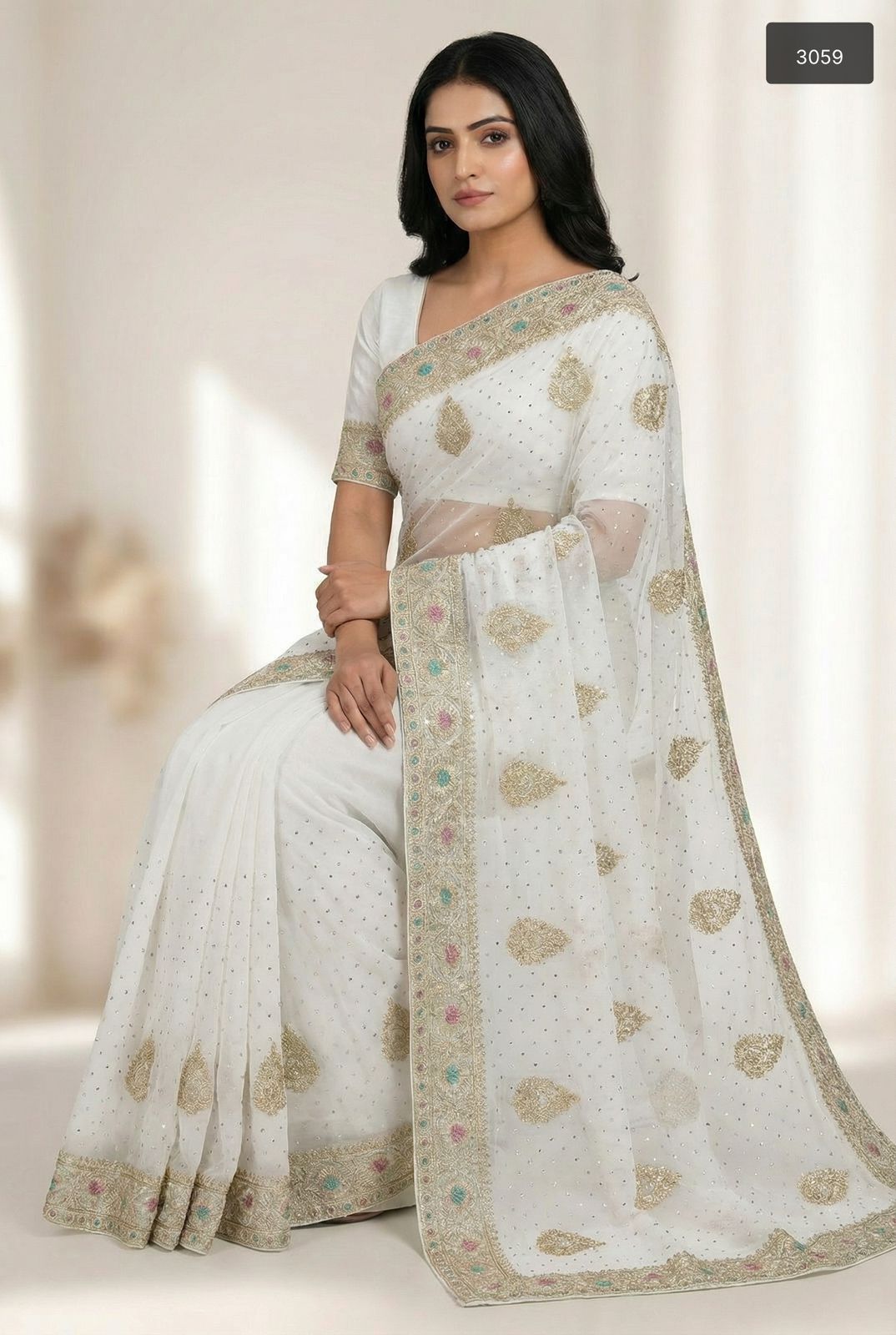Ethereal Grace: Ivory White Georgette Saree with Gold Zari & Pastel Accents