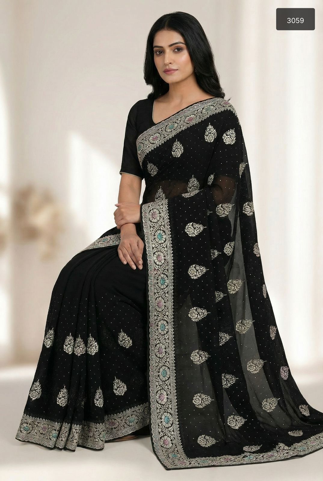 Elegance in Ebony: Black Georgette Saree with Silver Zari & Butta Work