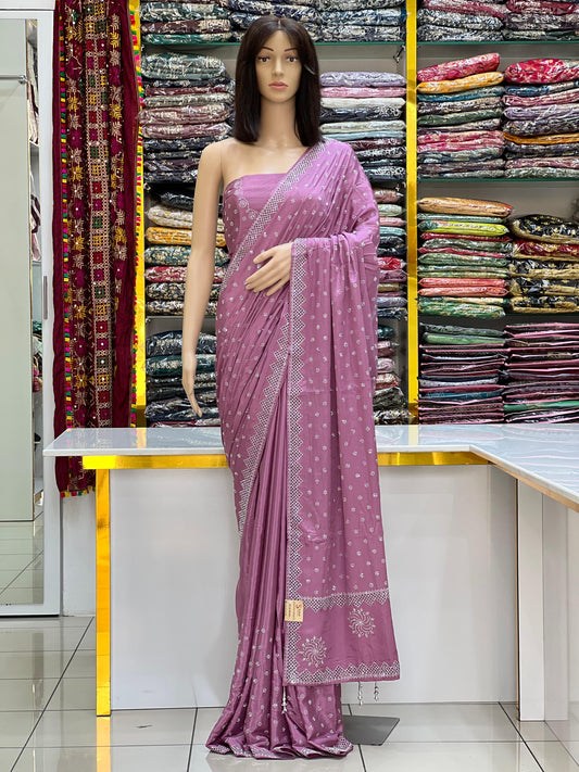 Elegant Sea Green Crepe Silk Saree with Geometric Silver Stone Work & Tassels