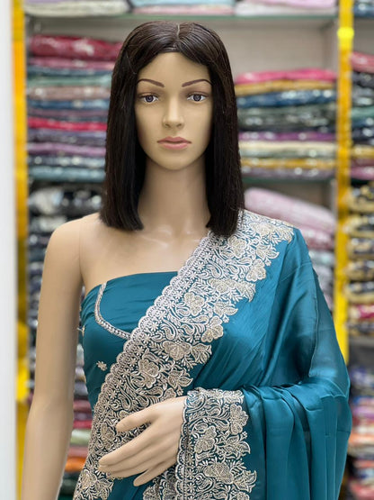 Elegant Teal Silk Saree with Heavy Silver Embroidery Border
