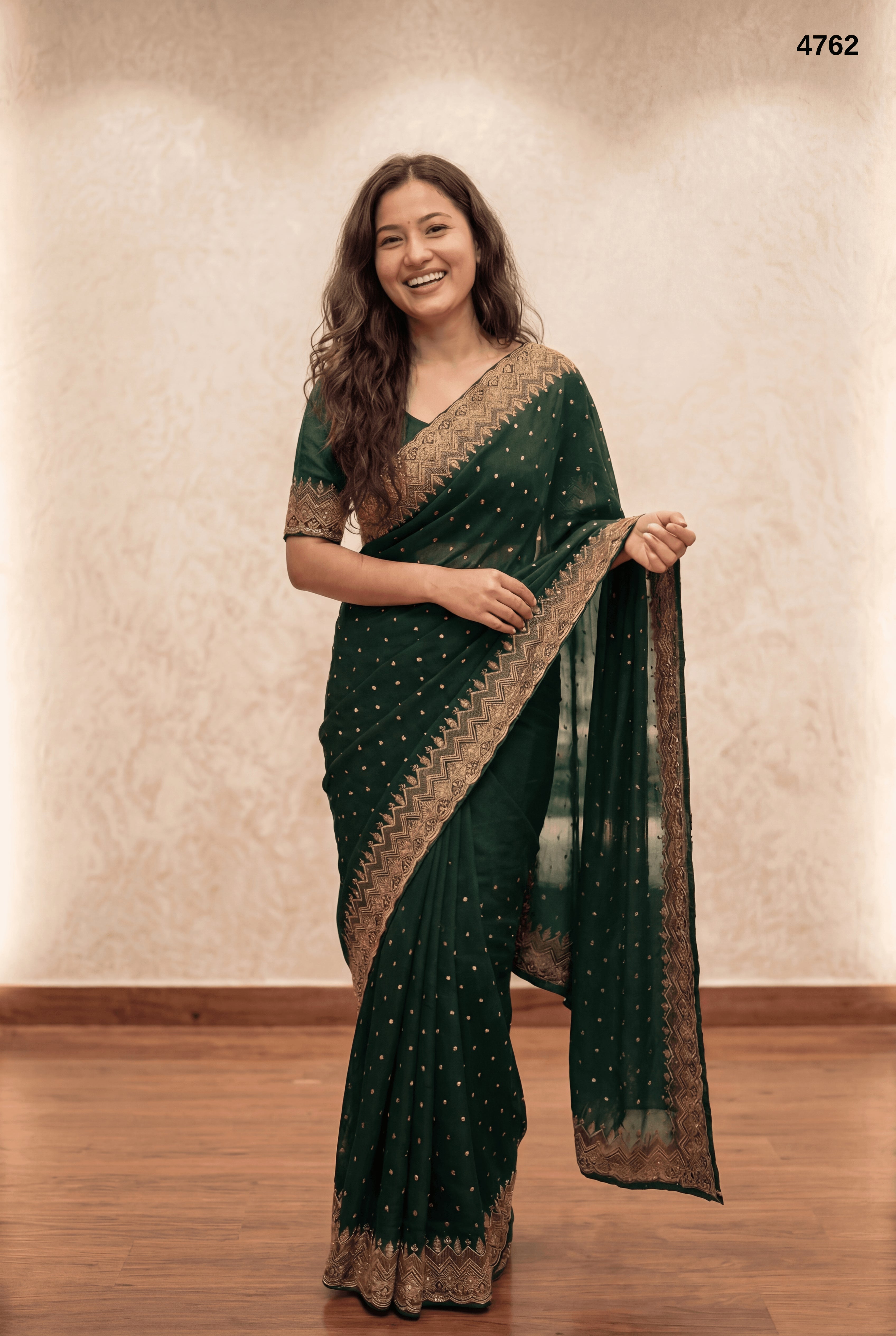 Elegant Dark Green Embroidered Saree with Gold Border – Graceful Festive & Party Wear