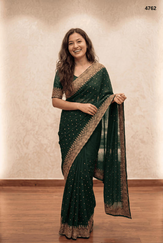 Elegant Dark Green Embroidered Saree with Gold Border – Graceful Festive & Party Wear